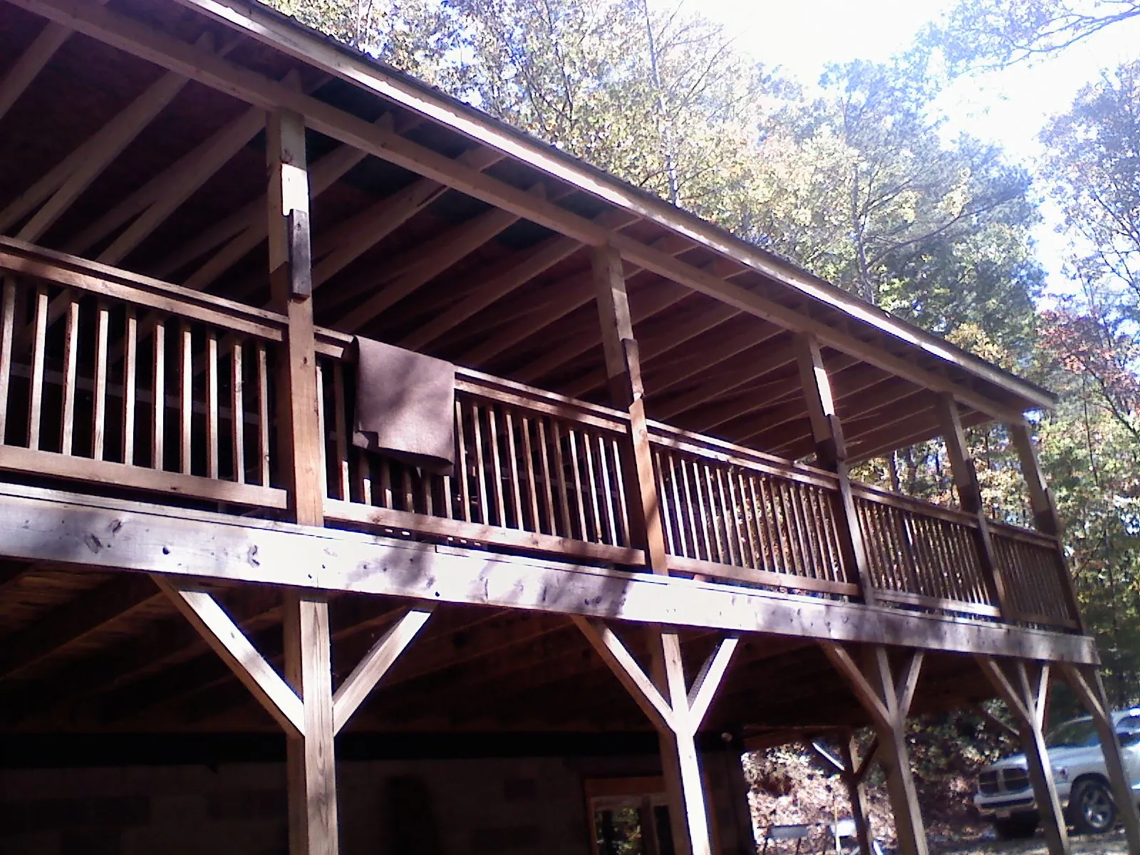 Timber framing under a new elevated porch and deck — Roof Leak Repair in Oldsmar by Roofing Brothers